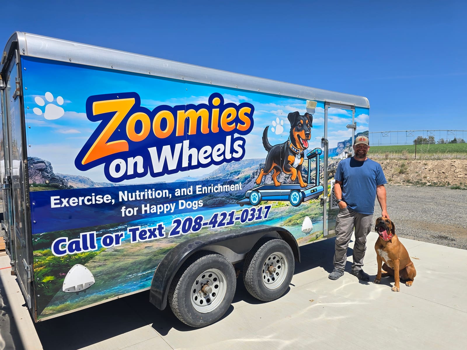 The Zoomies on Wheels trailer with Zack and his dog